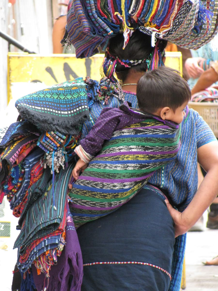 Large-scarf-kute-cloak-on-back-bundle-loads- and often also carrying babies.jpg